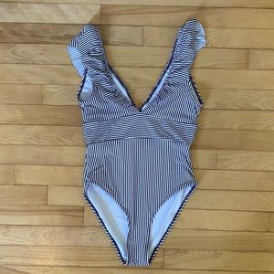 One piece swim suit. New without tags